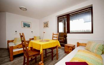 Třílůžkový pokoj