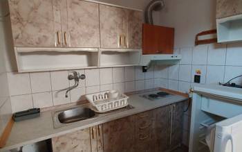 Štvorlôžková izba s kuchynským kútom