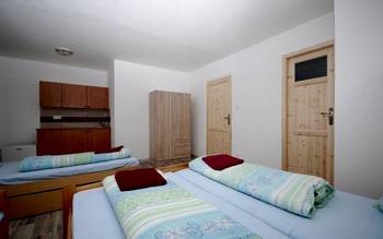 Třílůžkový pokoj s kuchyňkou a přistýlkou