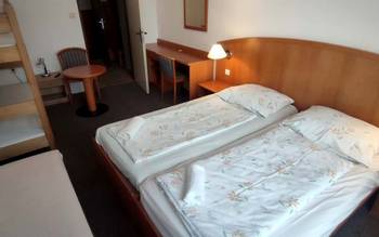 Čtyřlůžkový pokoj s palandou