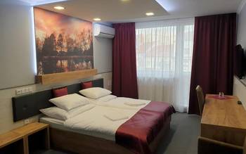 Dvoulůžkový pokoj DELUXE s přistýlkou klima + balkon
