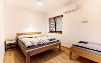 Čtyřlůžkový apartmán s přistýlkou