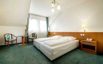 Jednolůžkový pokoj