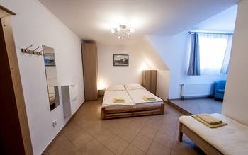 Čtyřlůžkový pokoj