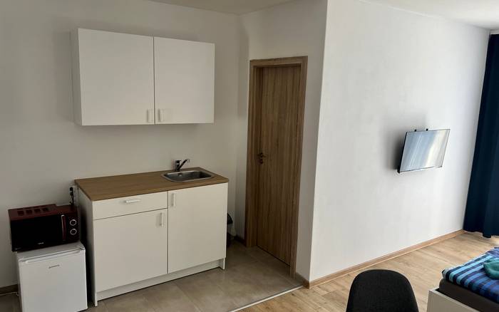 Dvojlôžkový apartmán s vlastnou kuchynkou a balkónom