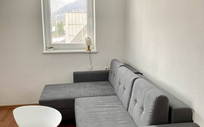 4-lôžkový apartmán - obývacia miestnosť