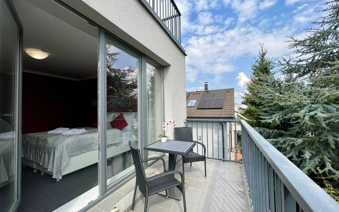 Delux Třílůžkový pokoj s balkonem