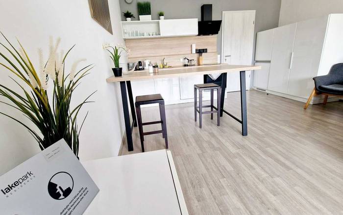 Studio 1+kk a balkonem s manželskou postelí