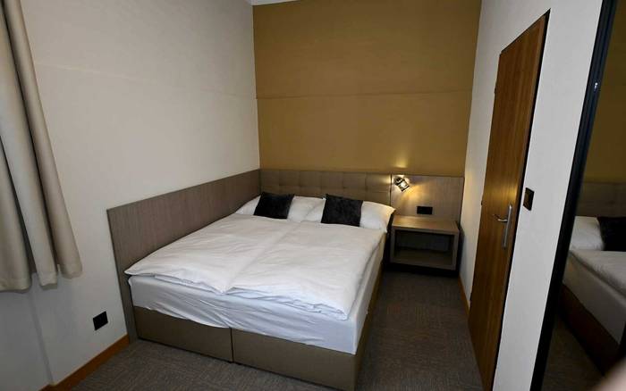 Třílůžkový pokoj Comfort s manželskou postelí