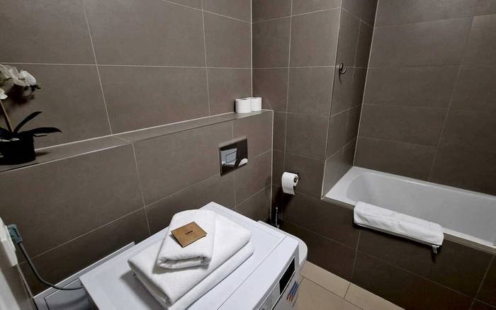 Studio 1+kk a balkonem s manželskou postelí