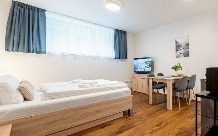 1.10 Dvoulůžkové studio s dětskou postýlkou