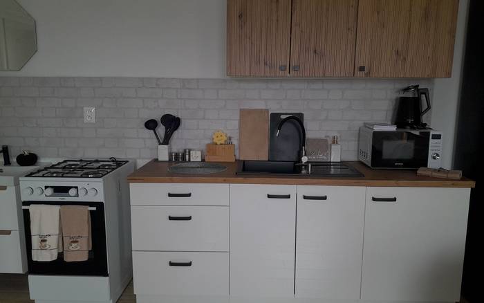 Obývací priestor s kuchynským kútom