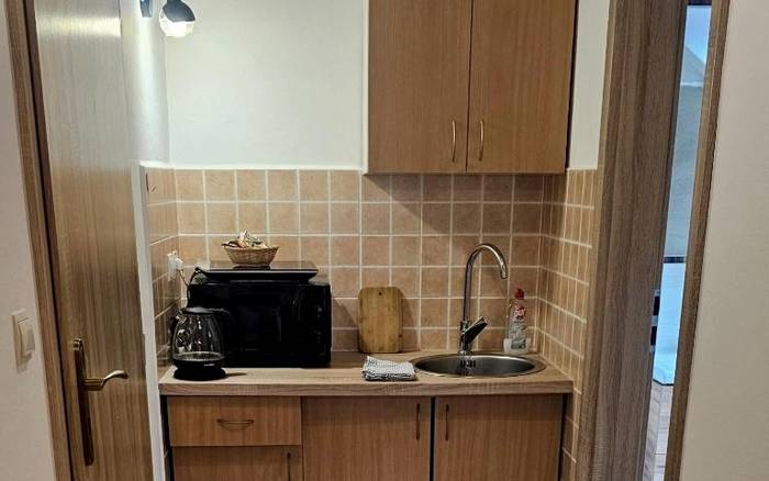 Veľká dvojlôžková izba s manželskou posteľou