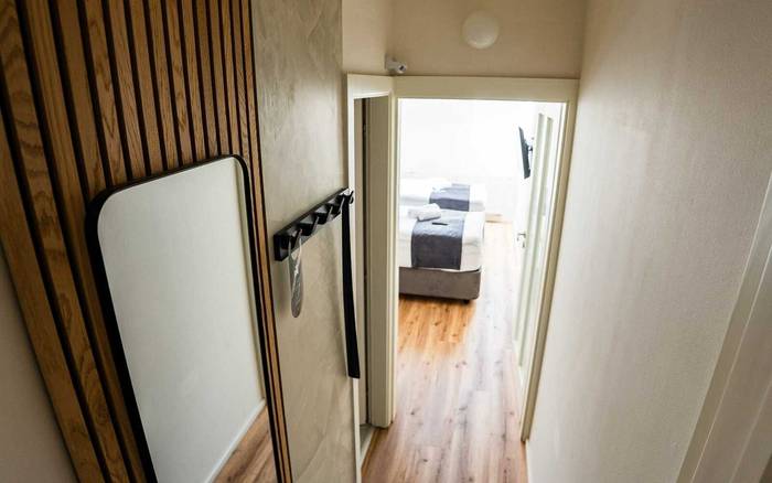 Malý dvoulůžkový pokoj s oddělenými postelemi