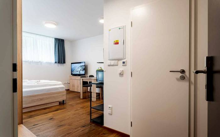 1.10 Dvoulůžkové studio s dětskou postýlkou