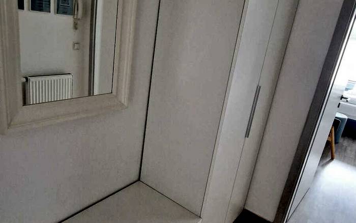 Studio 1+kk a balkonem s manželskou postelí
