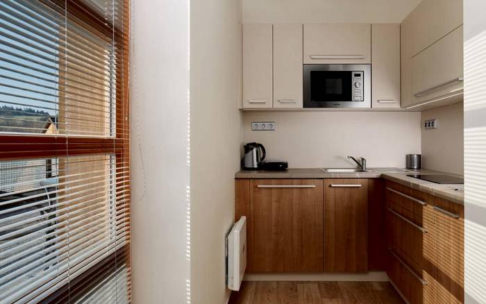 Mezonetový hotelový apartmán s balkónem a kuchyňkou