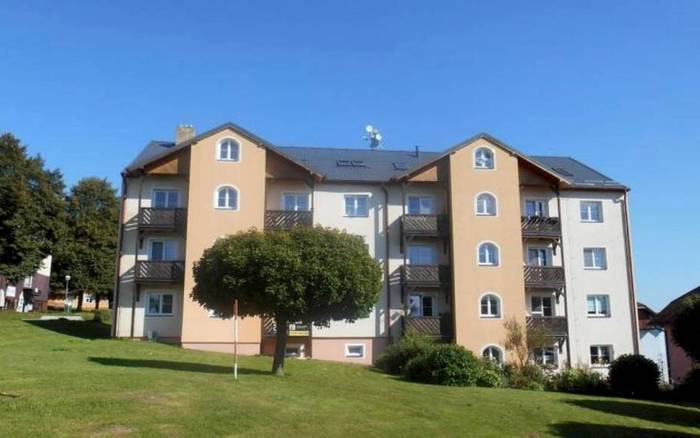  Apartmánová budova