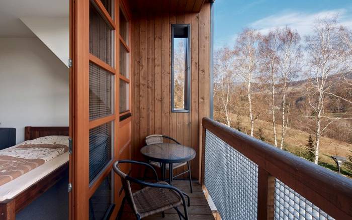 Mezonetový hotelový apartmán s balkónem a kuchyňkou