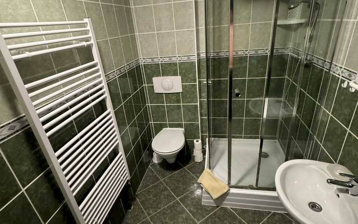 Třílůžkový pokoj s oddělenými postelemi