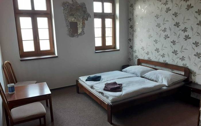 Dvoulůžkový pokoj s manželskou postelí
