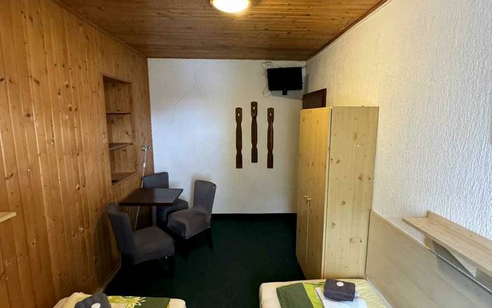Čtyřlůžkový pokoj s dvěma ložnicemi