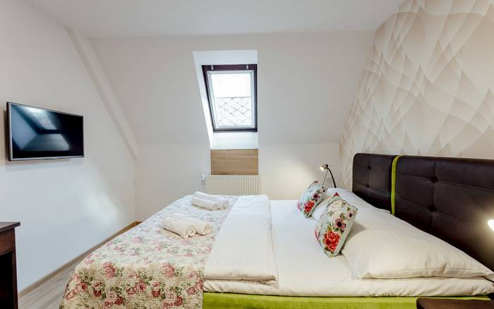 Rodinný apartmán (izba s manželskou posteľou a prístelkou)