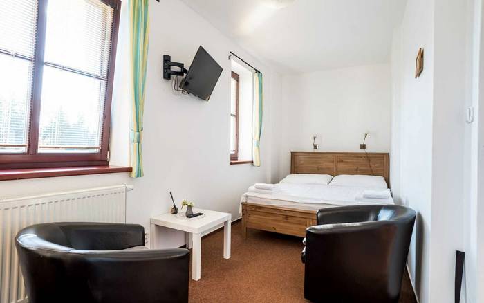 Dvoulůžkový pokoj s manželskou postelí