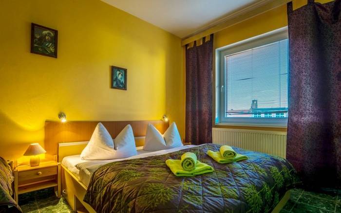 Štvorlôžkový apartmán s balkónom