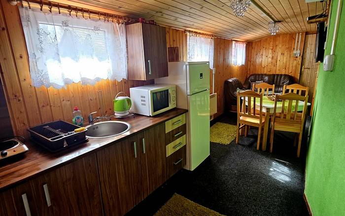 Дерев'яний будинок Талія