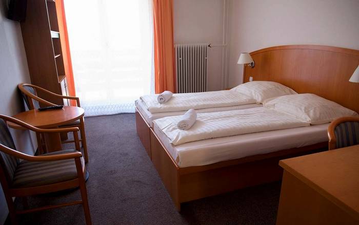 Třílůžkový pokoj