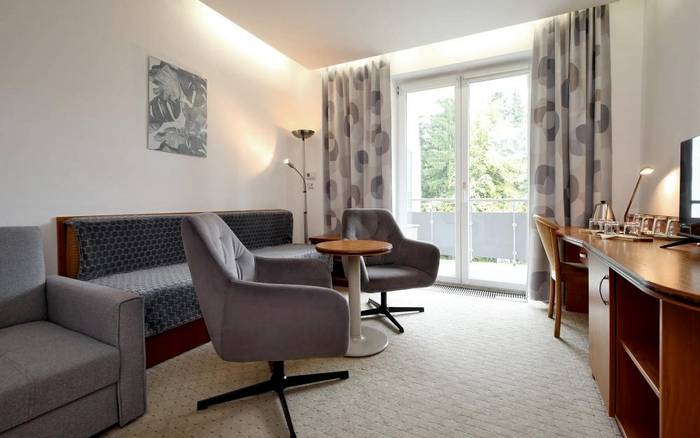 Apartmán s manželskou postelí, obývacím pokojem a terasou