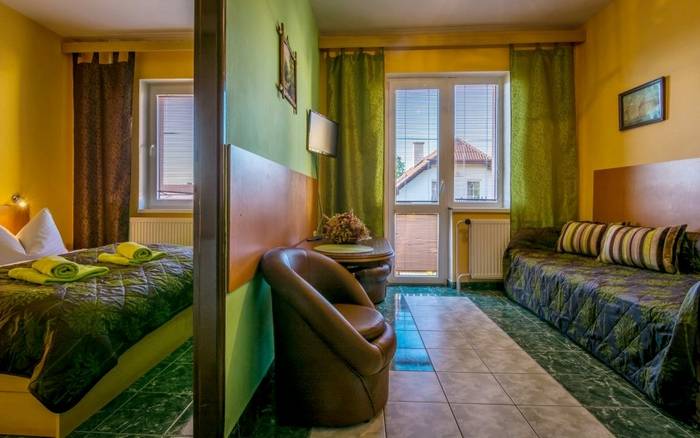 Štvorlôžkový apartmán s balkónom