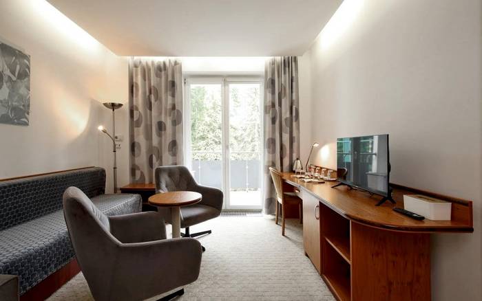 Apartmán s manželskou postelí, obývacím pokojem a terasou
