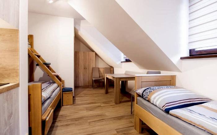 Čtyřlůžkový apartmán s palandou a přistýlkou č. 1