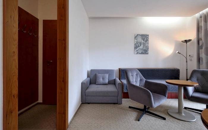 Apartmán s manželskou postelí, obývacím pokojem a terasou