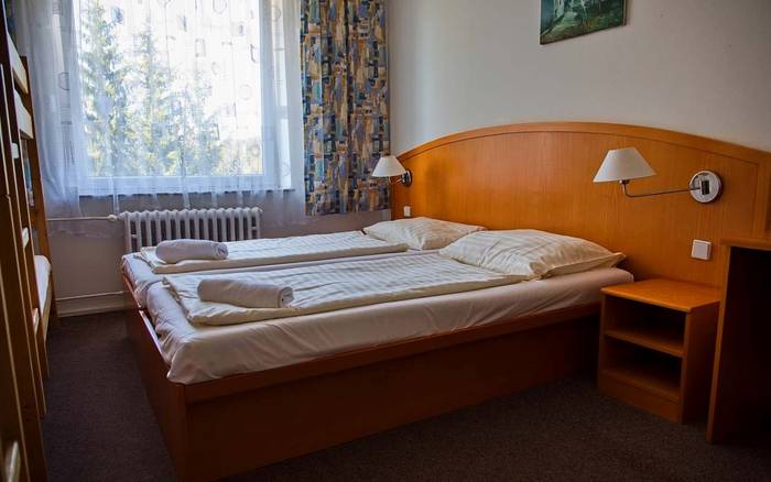 Čtyřlůžkový pokoj s palandou