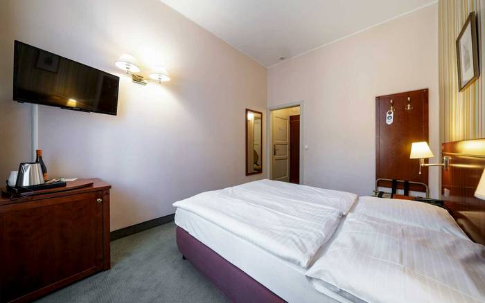 Dvoulůžkový pokoj s manželskou postelí