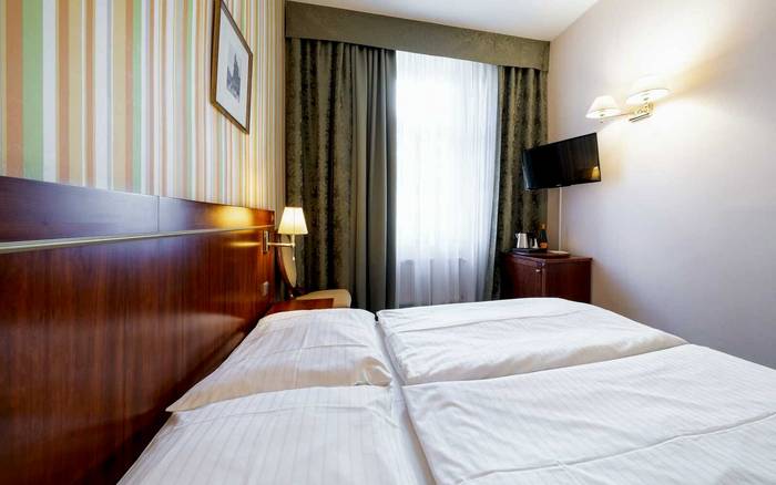 Dvoulůžkový pokoj s manželskou postelí