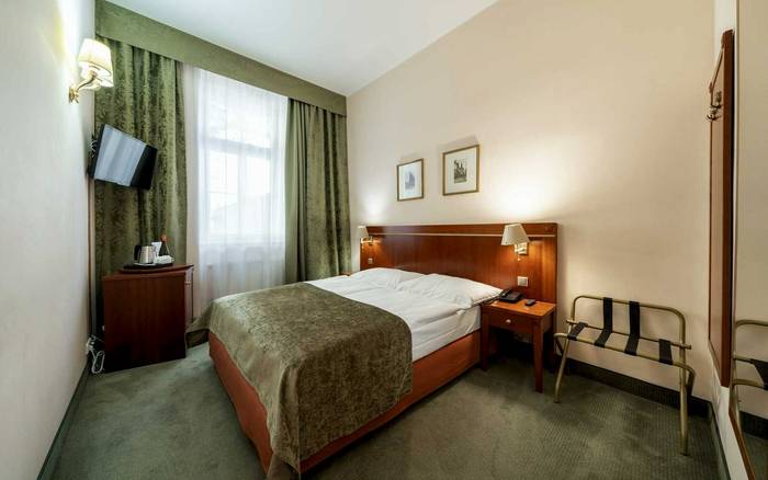 Dvoulůžkový pokoj s manželskou postelí