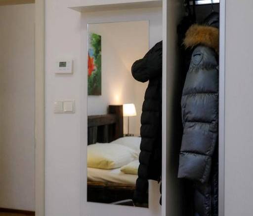 Dvoulůžkový pokoj s manželskou postelí a vlastní koupelnou